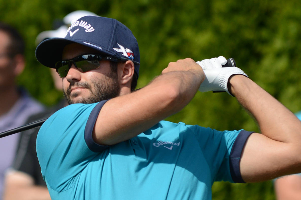 Adam Hadwin In Action During Professional Golf Tournament Wallpaper