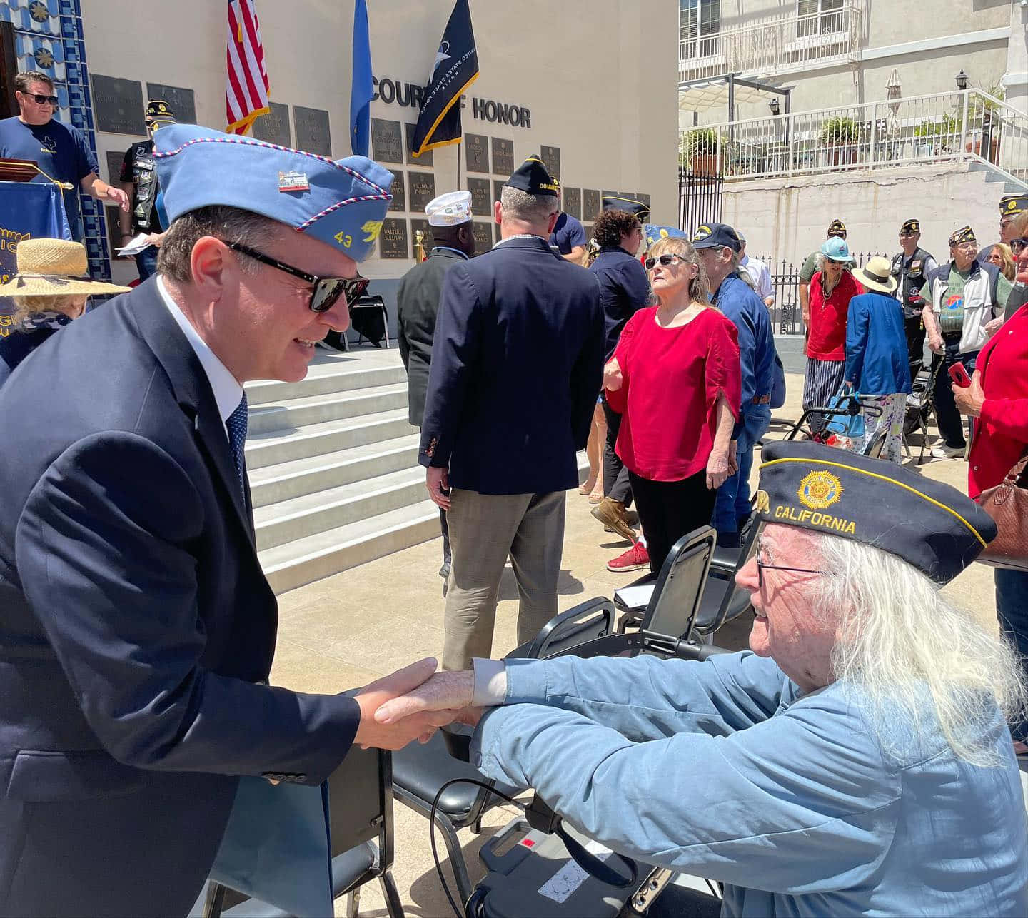 Adam Schiff Handshaking A Veteran Wallpaper