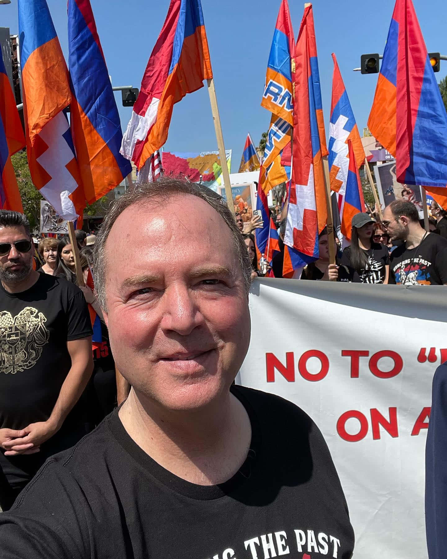 Adam Schiff Taking A Sunlit Selfie Wallpaper