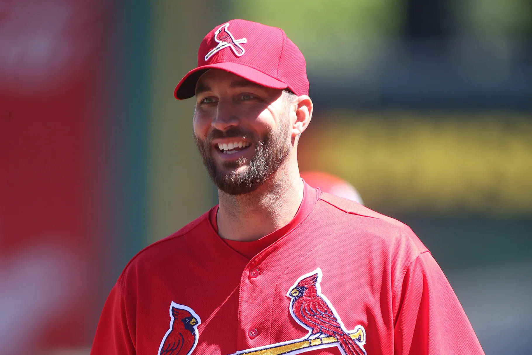 Adam Wainwright In His Vibrant Cardinals Jersey And Cap Wallpaper