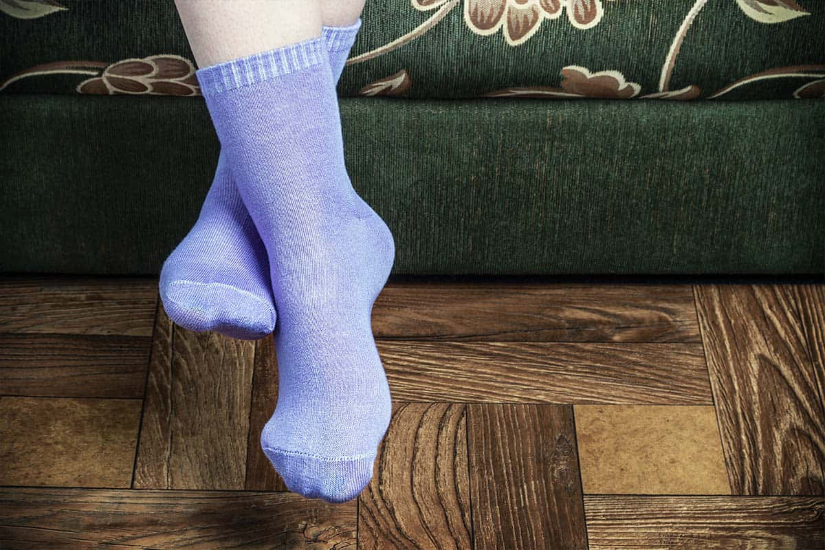 Add A Pop Of Color To Any Outfit With Purple Socks! Wallpaper