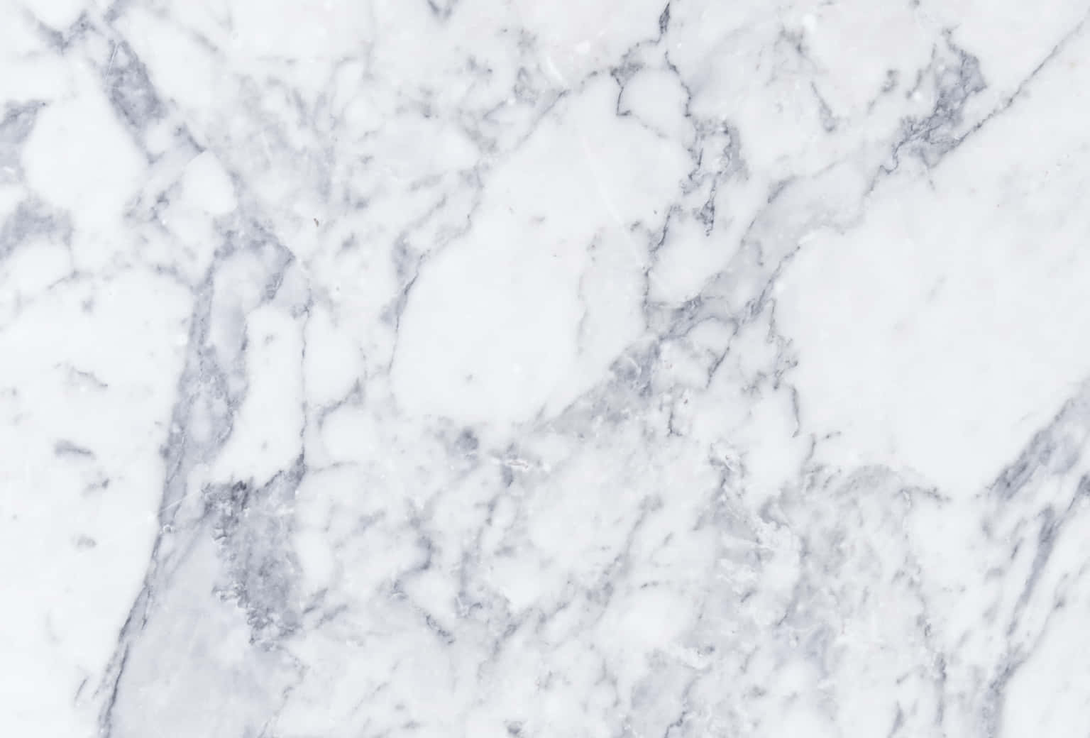 Add A Touch Of Luxury And Minimalism To Your Workspace With This Aesthetic Marble Desktop Wallpaper