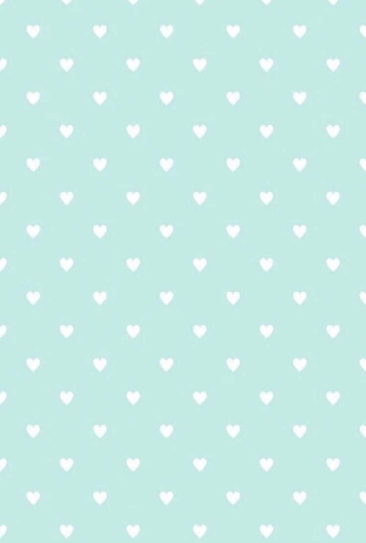 Add Some Fun To Your Day With Mint Green Hearts Wallpaper