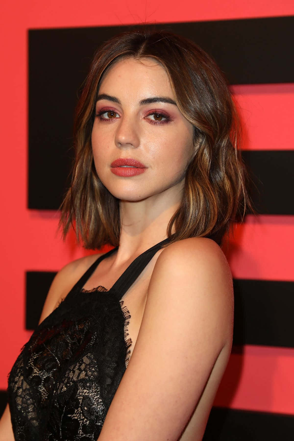 Adelaide Kane Red Backdrop Portrait Wallpaper