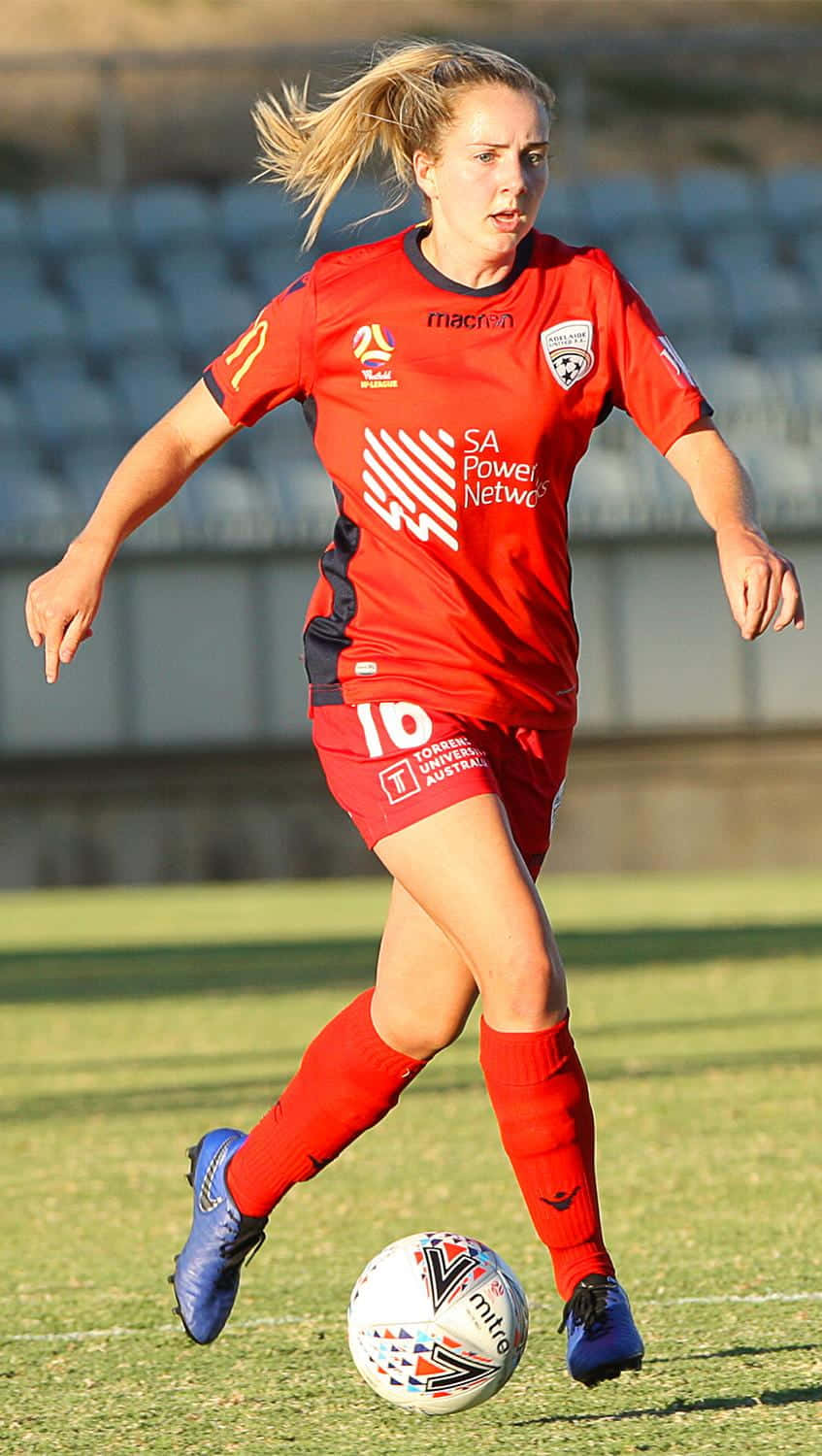 Adelaide United Team In Action During A Match. Wallpaper