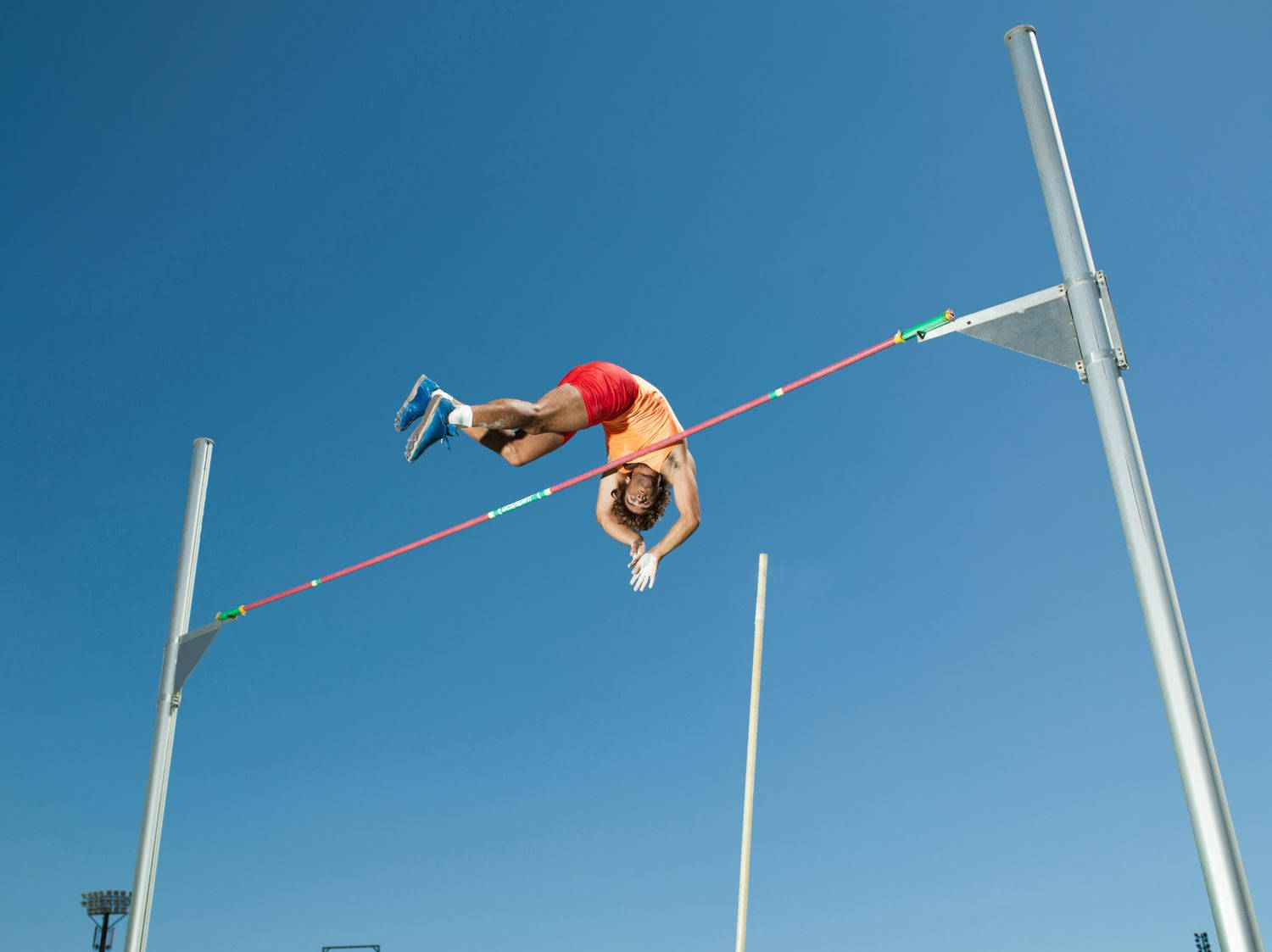 Admirable Male Pole Vault Athlete Wallpaper