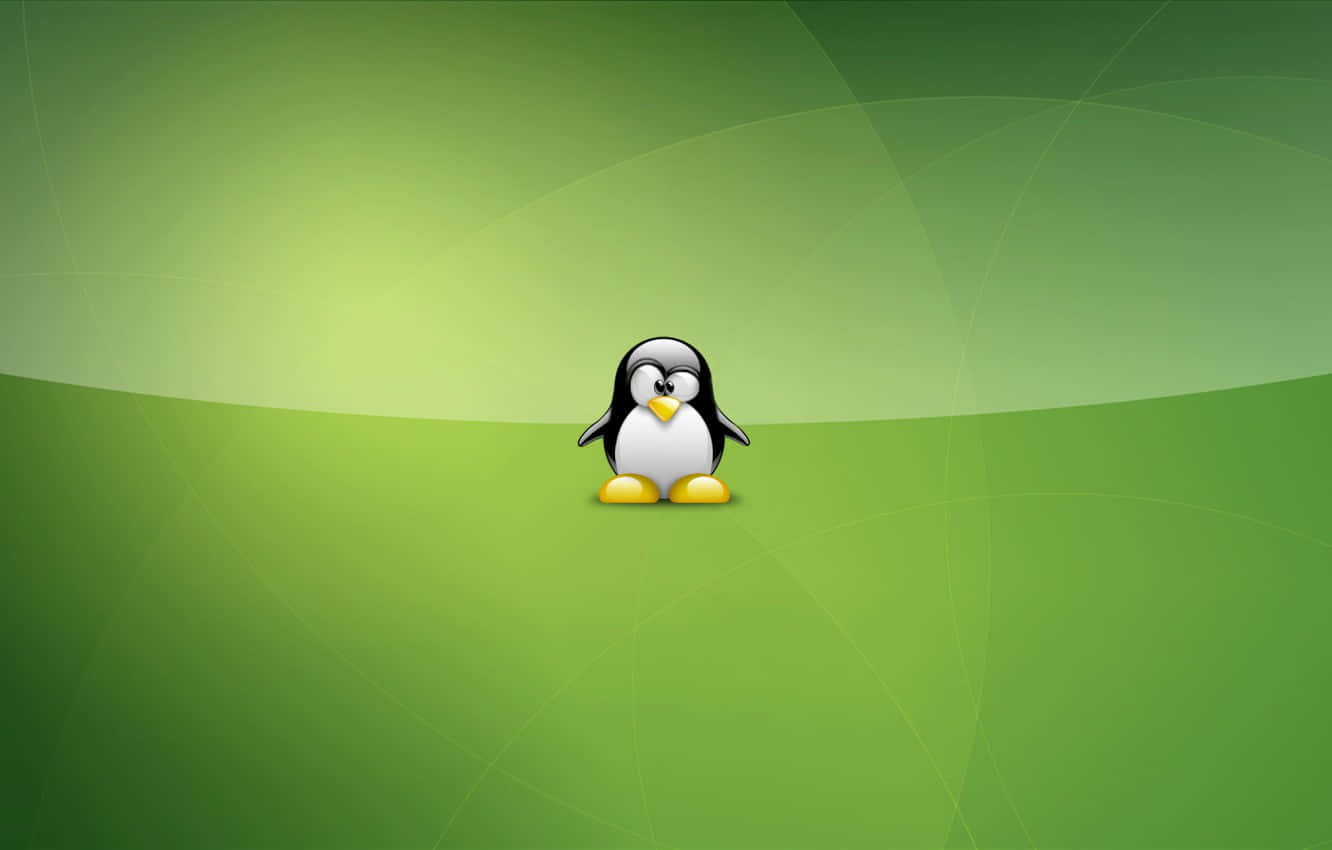 Adorable Tux The Penguin In A Snowy Landscape Wallpaper