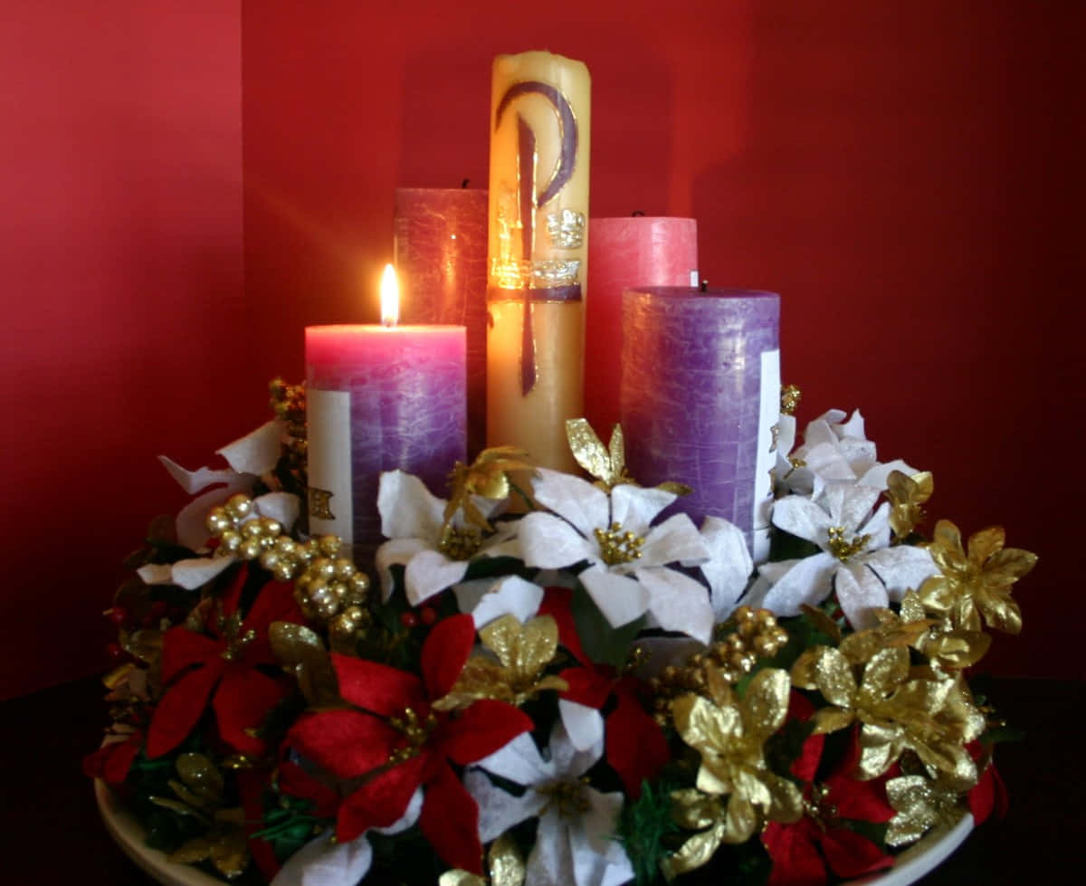 Advent Candlesand Christmas Floral Arrangement Wallpaper