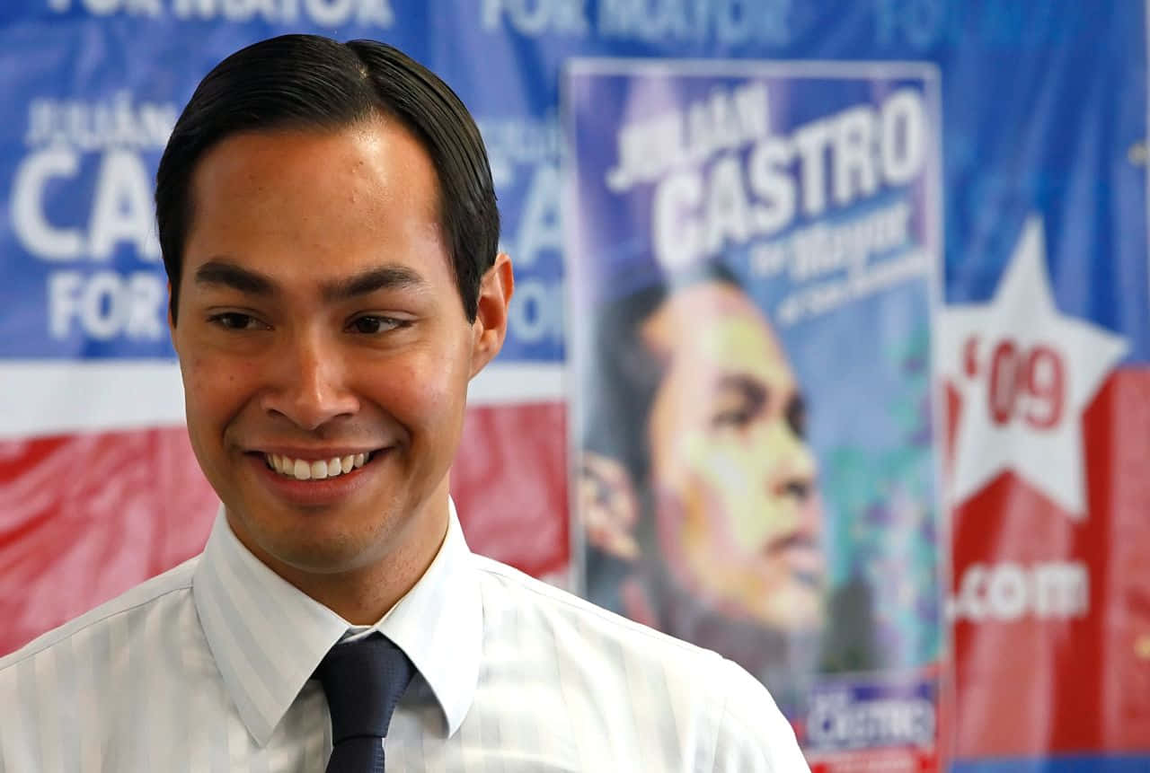 Advocate For Change - Julian Castro Amidst Campaign Posters Wallpaper