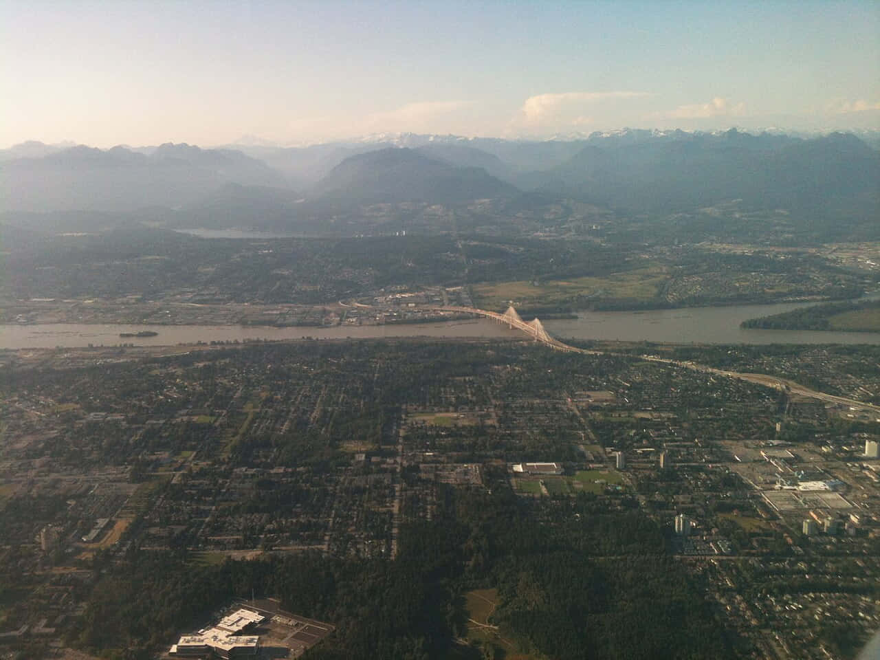 Aerial_ View_of_ Surrey_ Canada_with_ Mountains Wallpaper