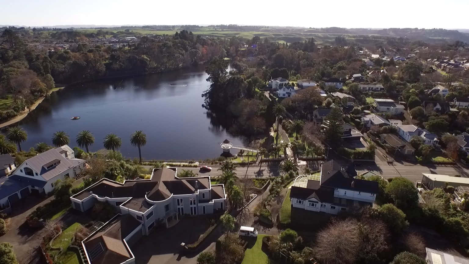 Aerial Viewof Whanganui Riverand Residential Area Wallpaper