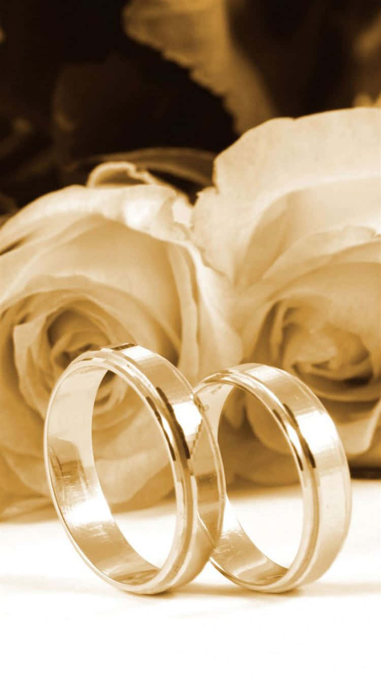 Aesthetic Wedding Ring With Flowers Wallpaper