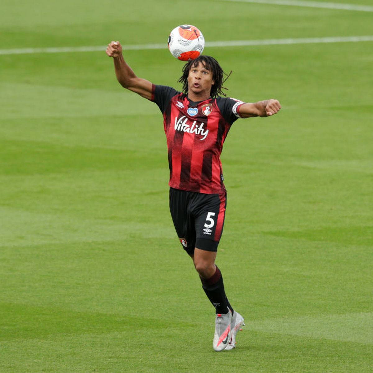 Afc Bournemouth Nathan Ake Catching Ball Wallpaper