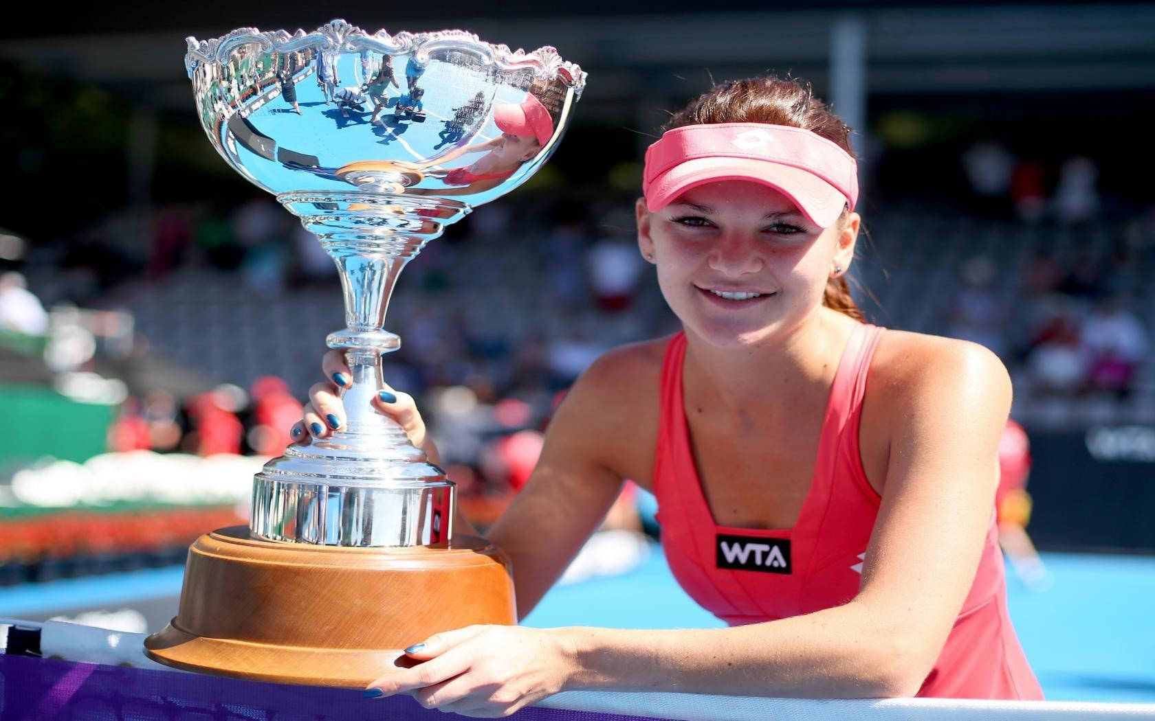 Agnieszka Radwanska Posing Next To Trophy Wallpaper