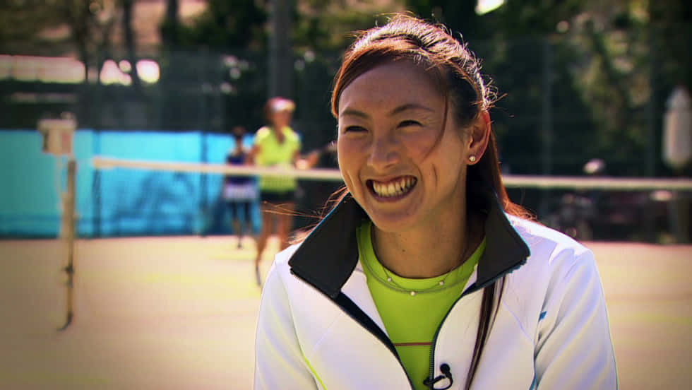 Ai Sugiyama Smiling During An Interview Wallpaper