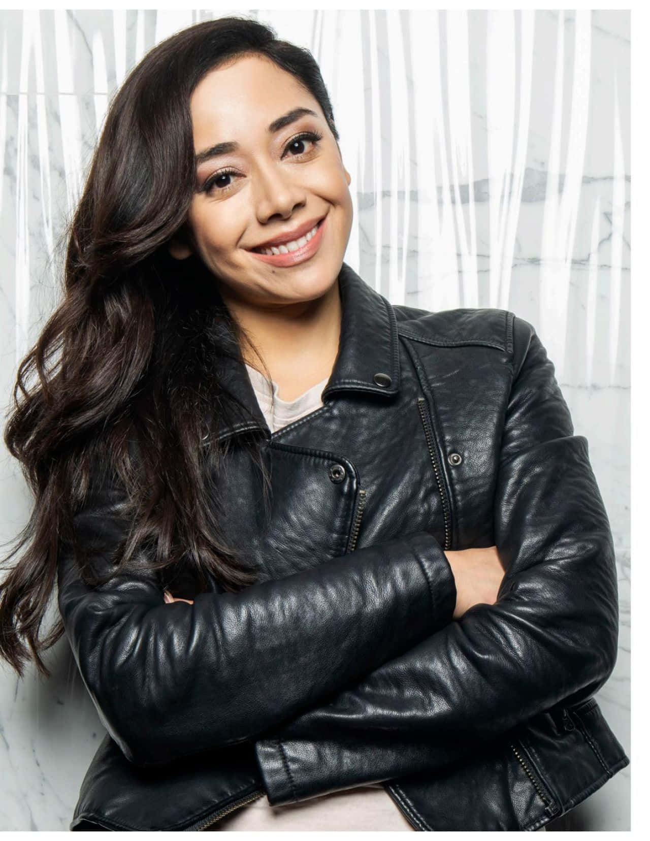 Aimee Garcia Smiles Charmingly In A Casual Outfit. Wallpaper