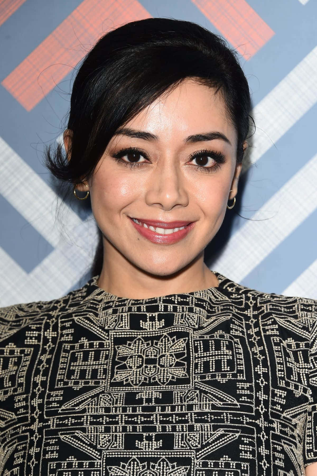 Aimee Garcia Striking A Pose In Elegant Attire Wallpaper