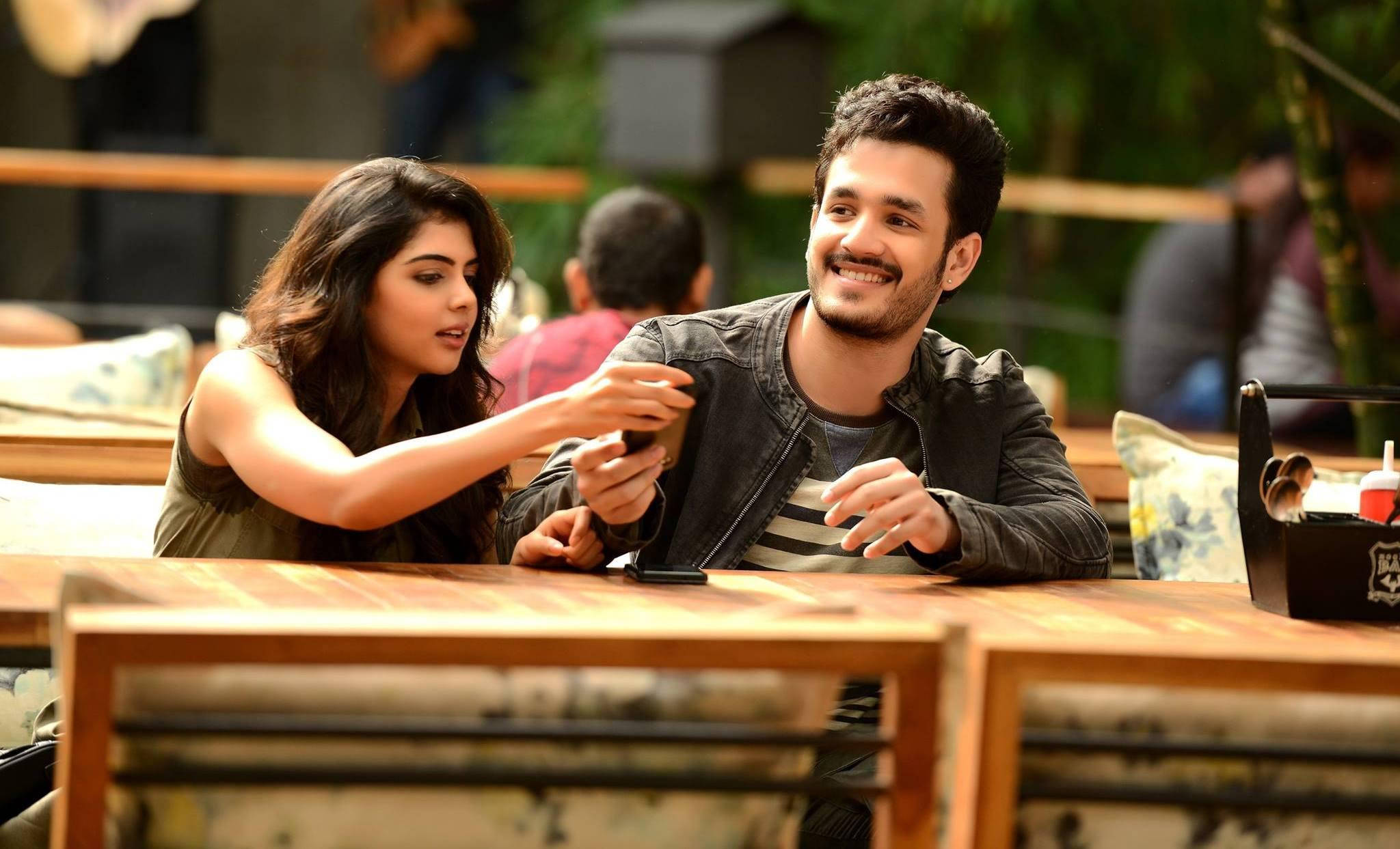 Akhil Akkineni And Kalyani Priyadarshan Sitting Wallpaper