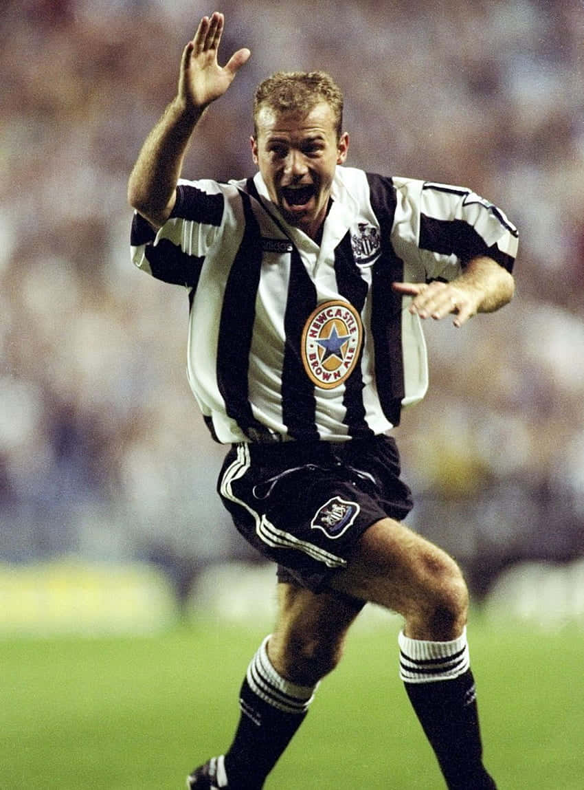 Alan Shearer Celebrating In Newcastle United Fc Kit Wallpaper