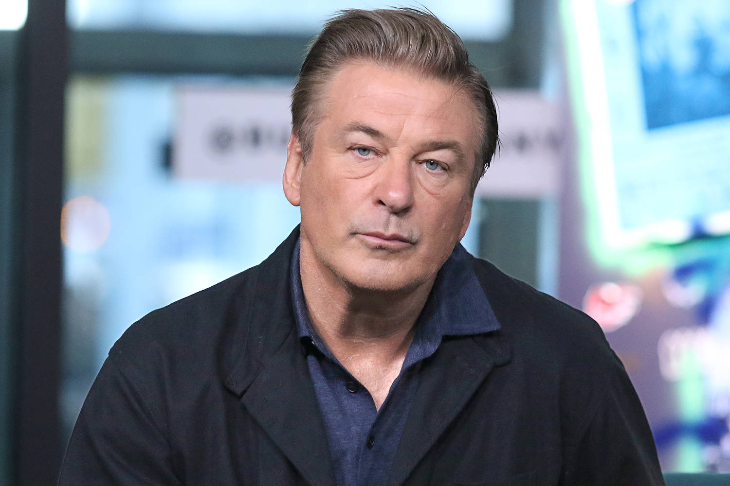 Alec Baldwin During An Interview Wallpaper