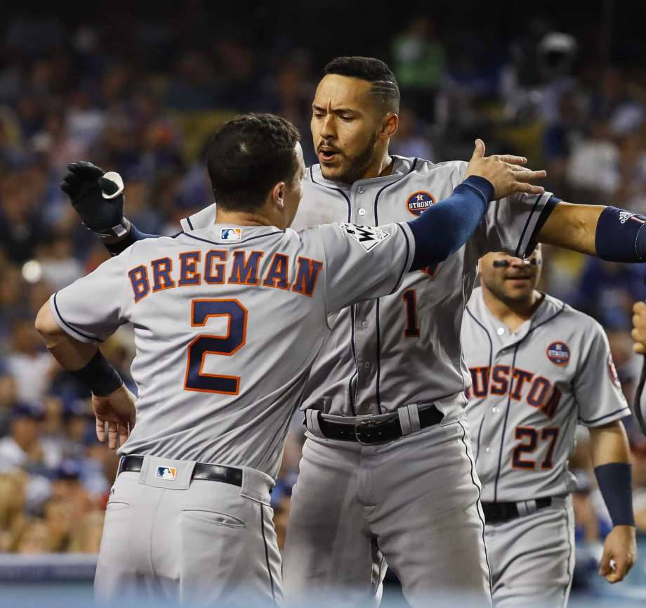 Alex Bregman And Carlos Correa Goofing Around Wallpaper