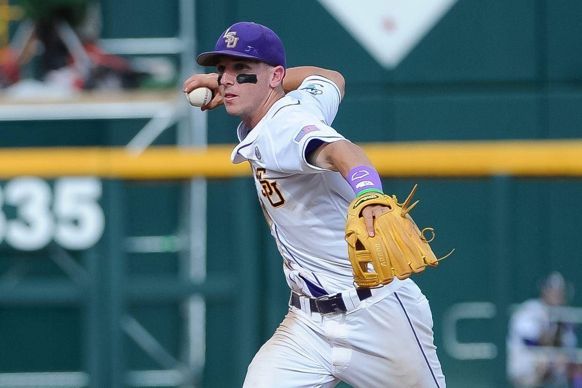 Alex Bregman Holding Baseball Lsu Uniform Wallpaper