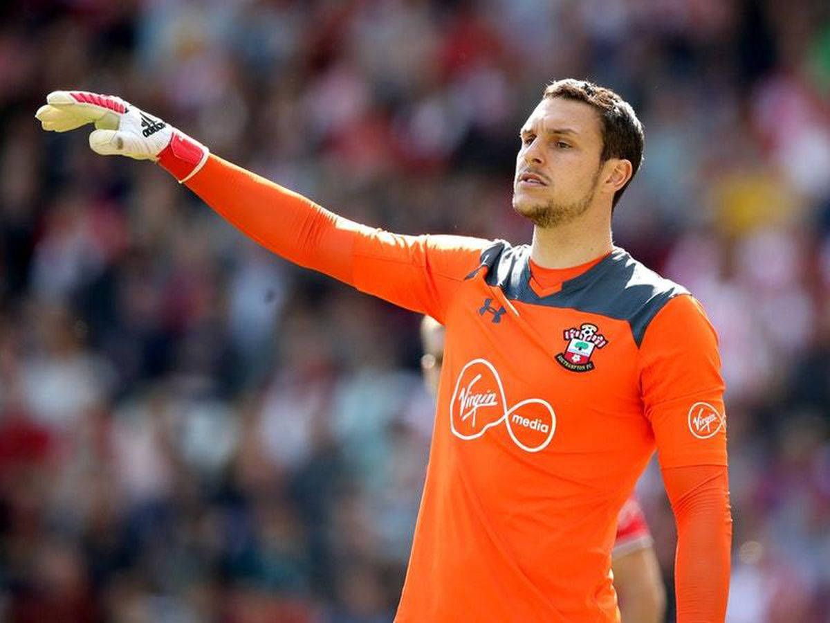 Alex Mccarthy In Bright Orange Jersey Wallpaper