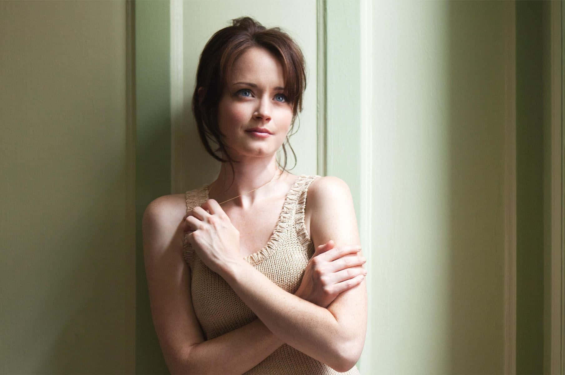 Alexis Bledel Striking A Pose During A Photoshoot. Wallpaper