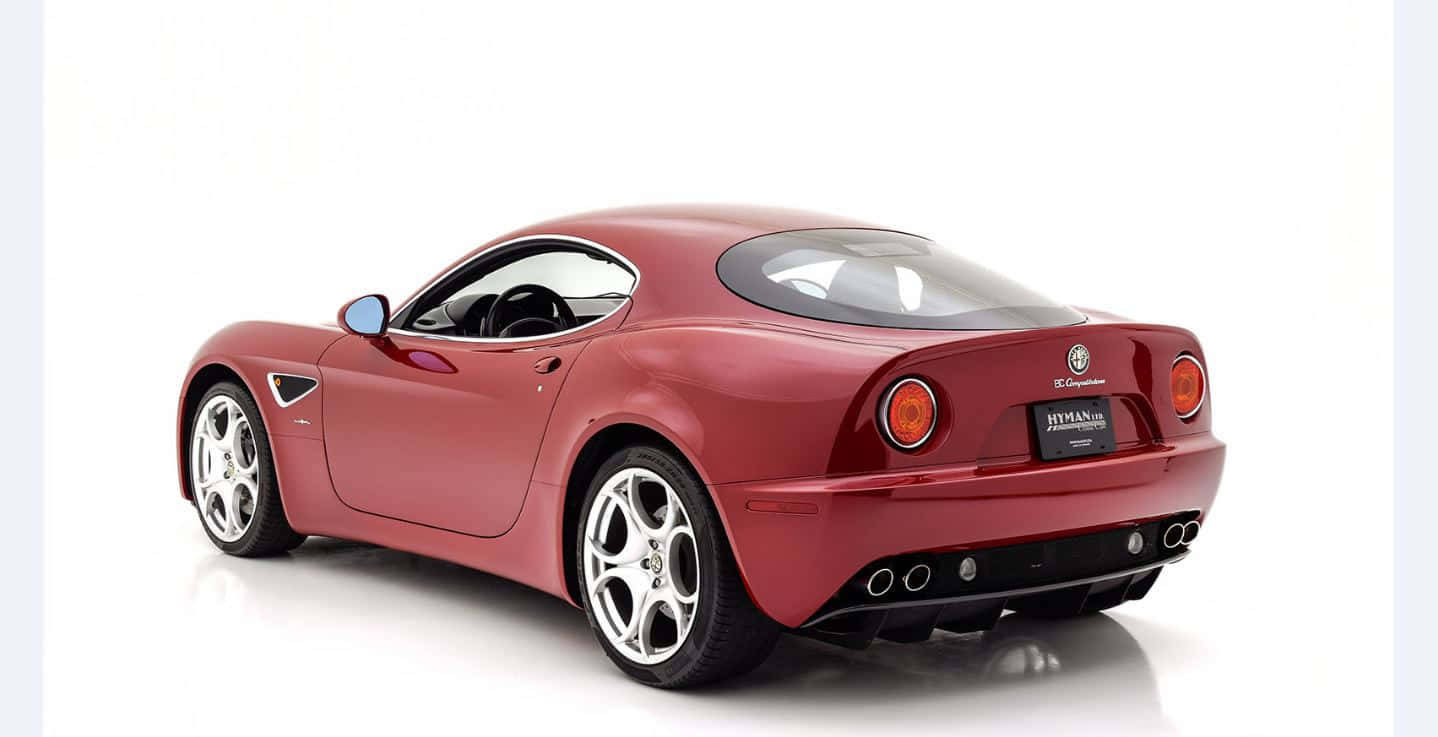 Alfa Romeo 8c Competizione - A Timeless Italian Masterpiece Wallpaper