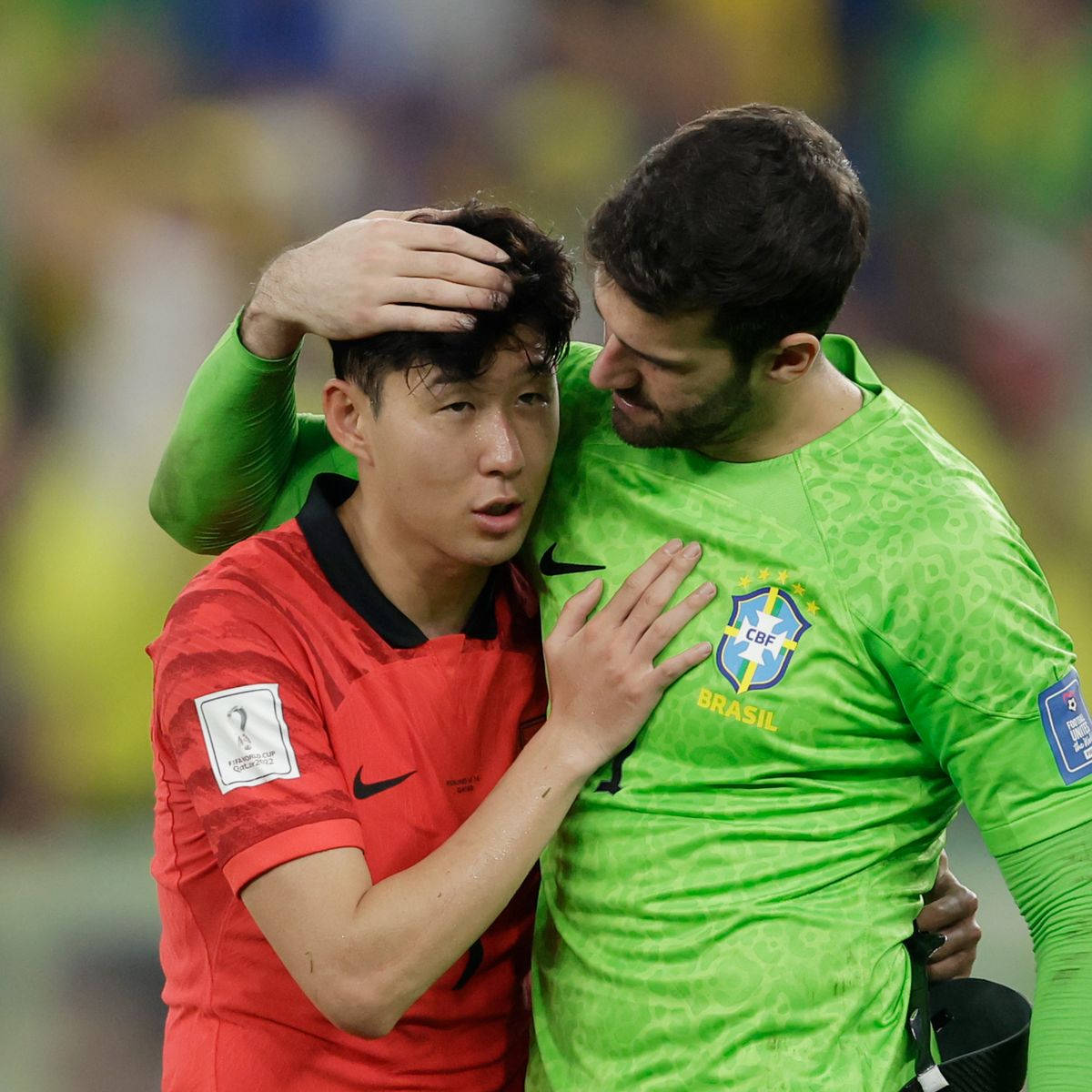 Alisson Becker Hugging Son Heung Min Wallpaper