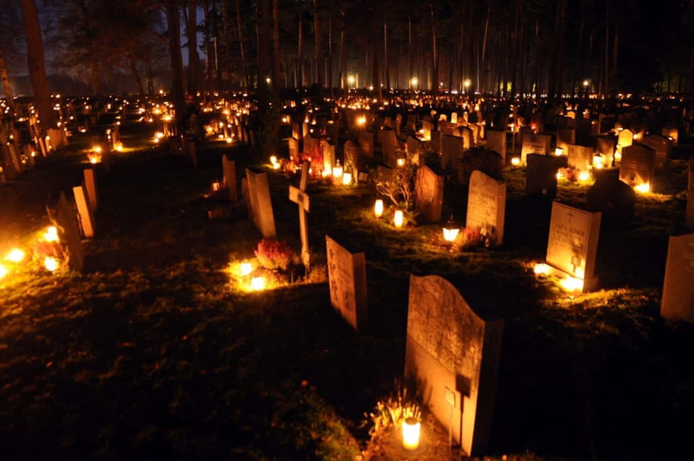 All Souls' Day Commemoration - Serene Candlelit Cemetery Scene Wallpaper