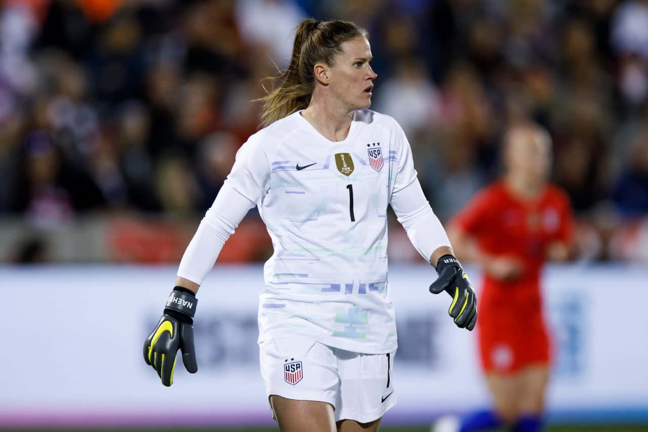 Alyssa Naeher: Us Women's National Goalkeeper In Action Wallpaper