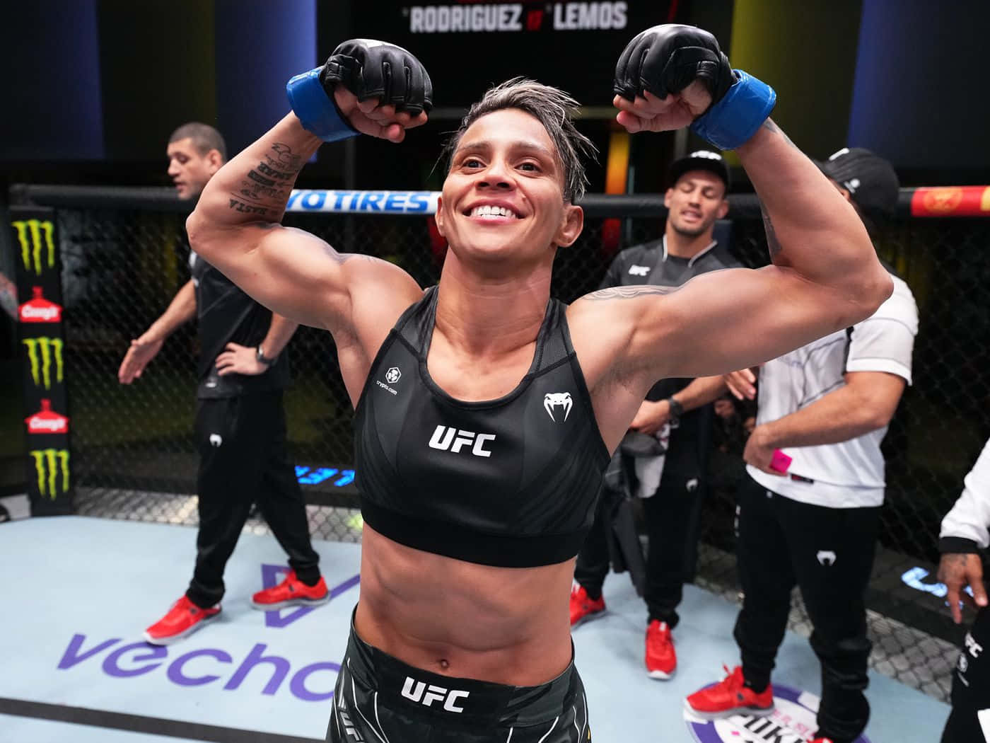 Amanda Lemos Triumphant In The Ufc Octagon Wallpaper