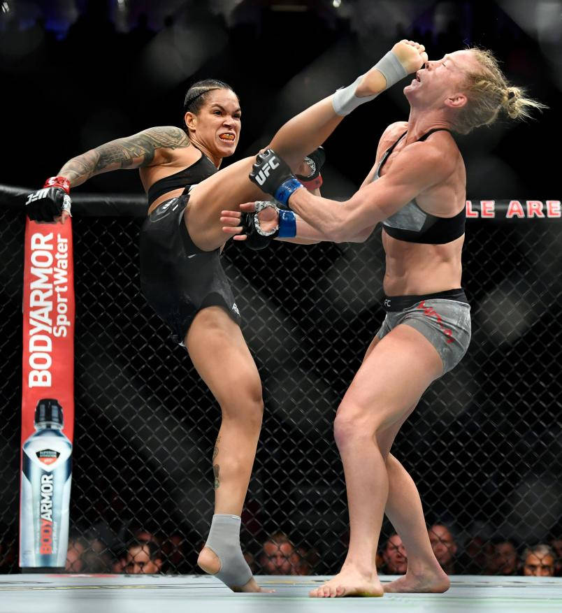 Amanda Nunes Kicks Holly Holm Wallpaper