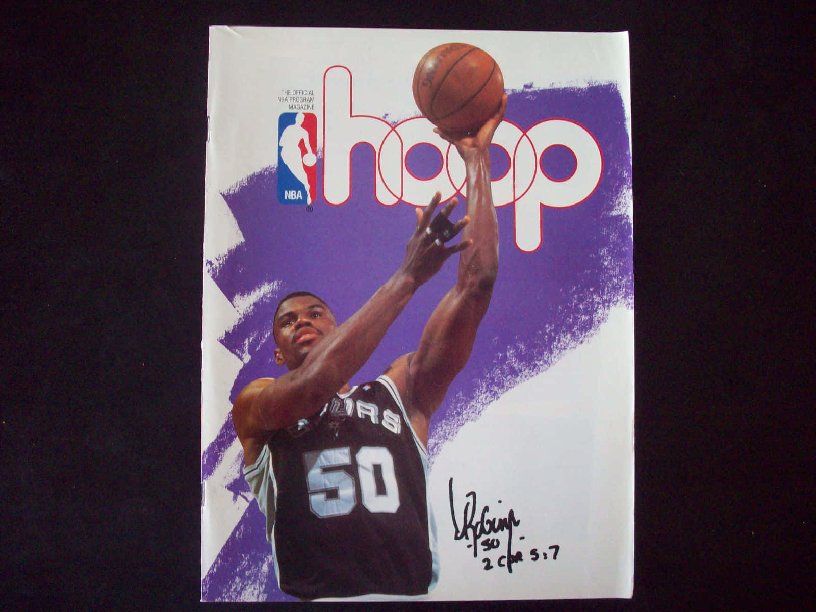 American Basketball Legend David Robinson Executing A Spectacular Dunk. Wallpaper