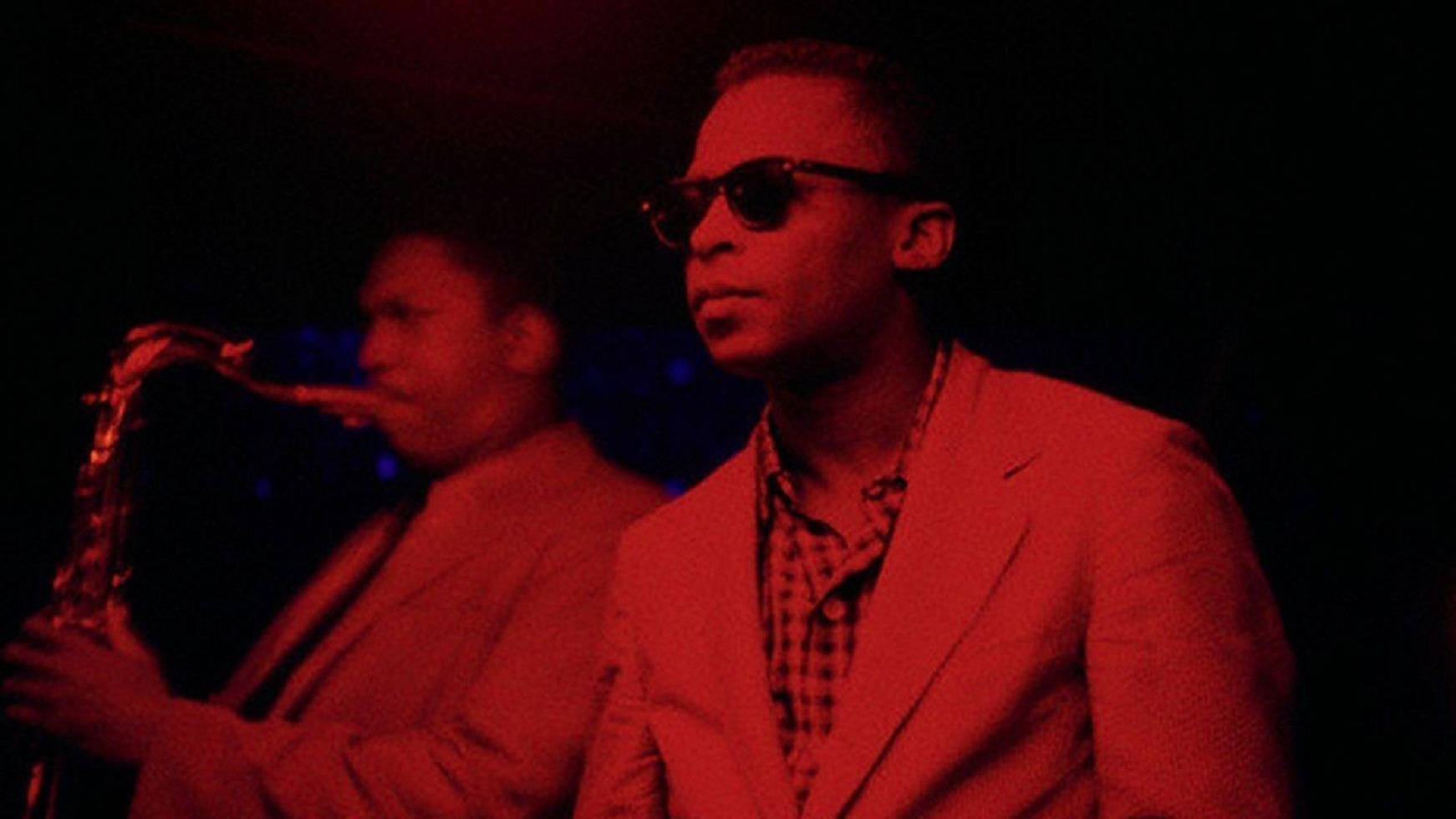 American Jazz Musicians John Coltrane And Miles Davis Wallpaper