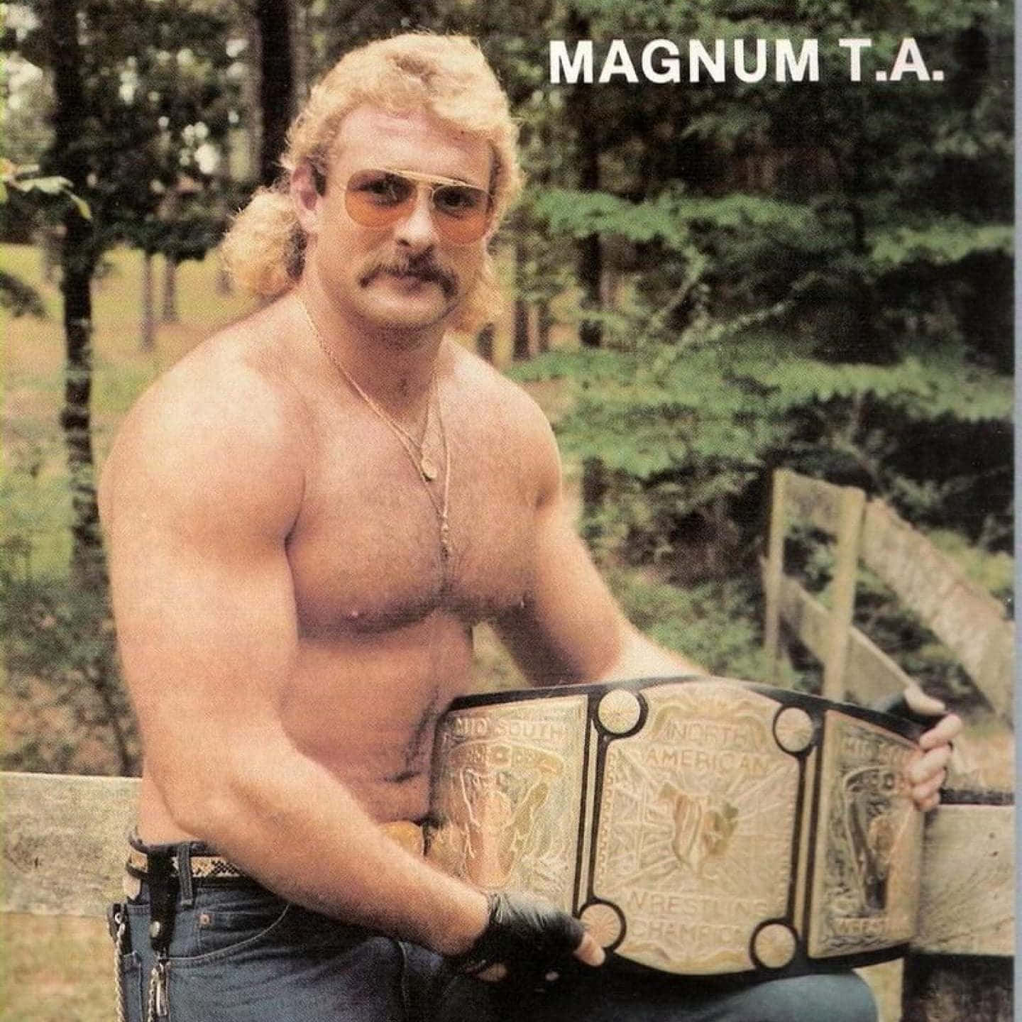 American Pro Wrestler Magnum Ta With A Championship Belt Wallpaper