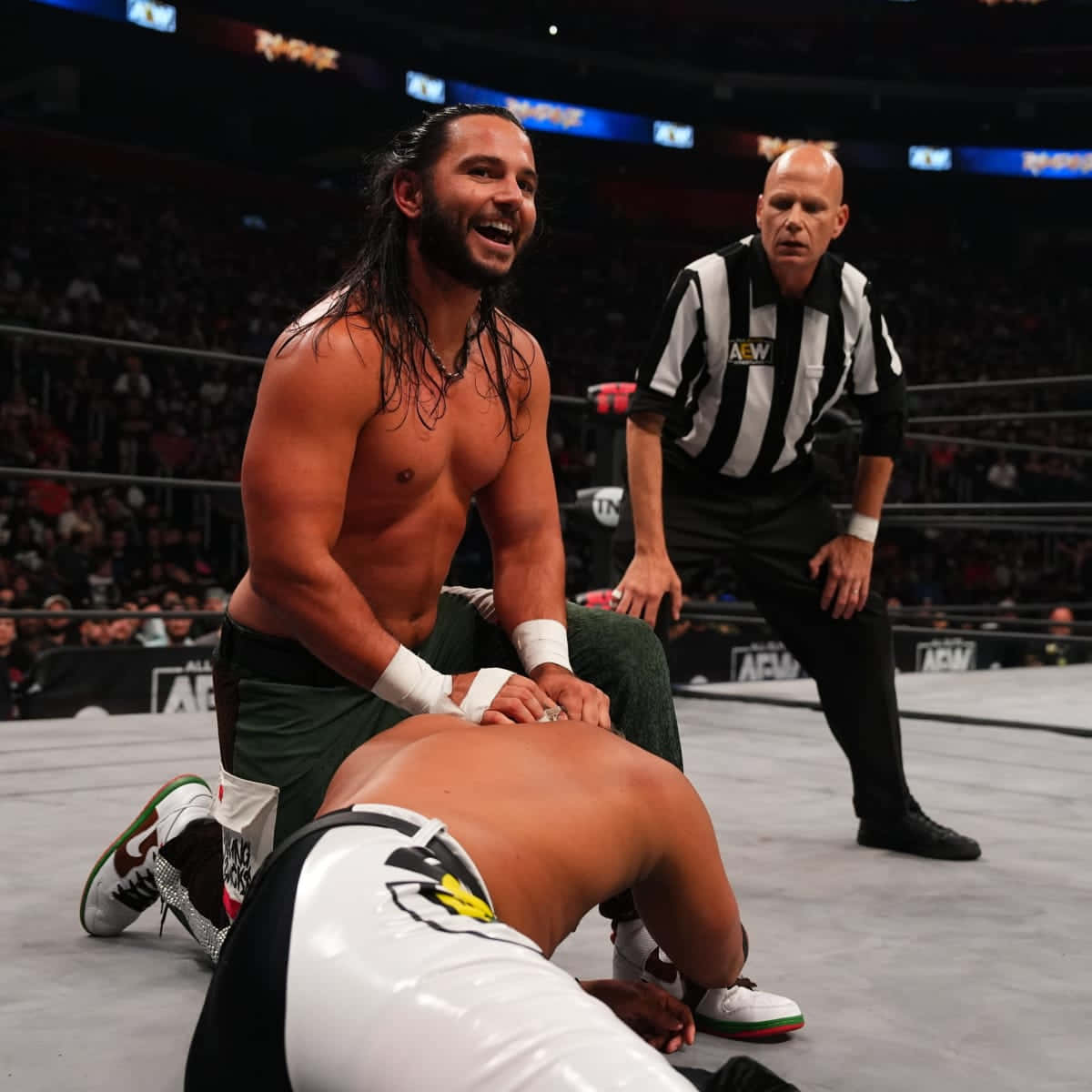 American Professional Wrestlers Matt Jackson Holding His Opponent Wallpaper