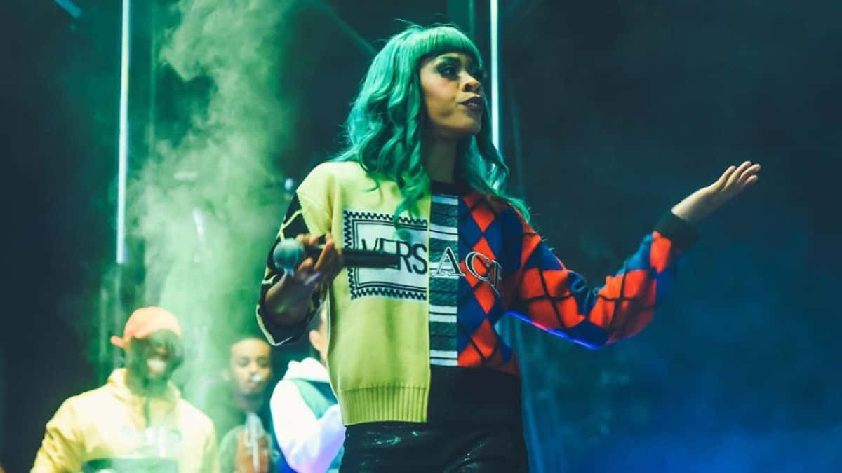 American Rapper Rico Nasty Poses In A Studio Wallpaper