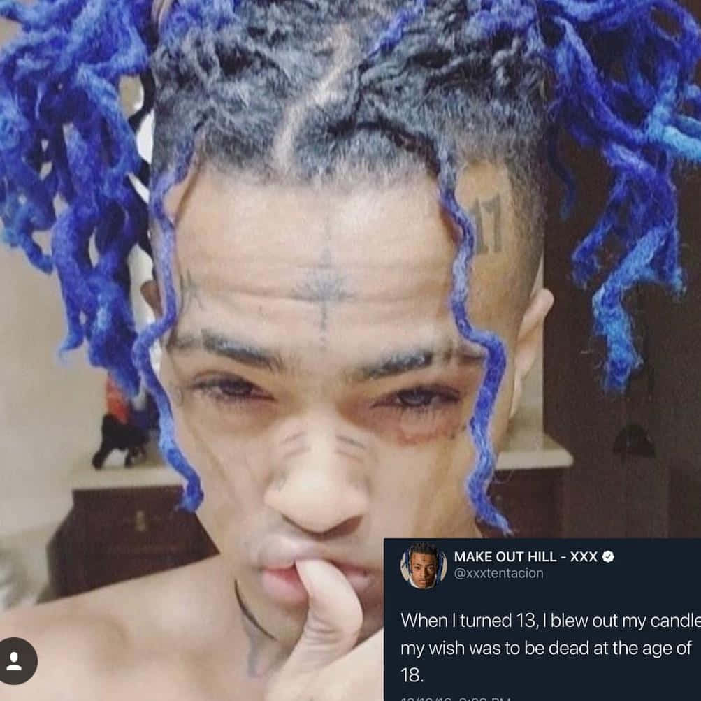 American Rapper Xxxtentacion With Signature Blue Hair Wallpaper