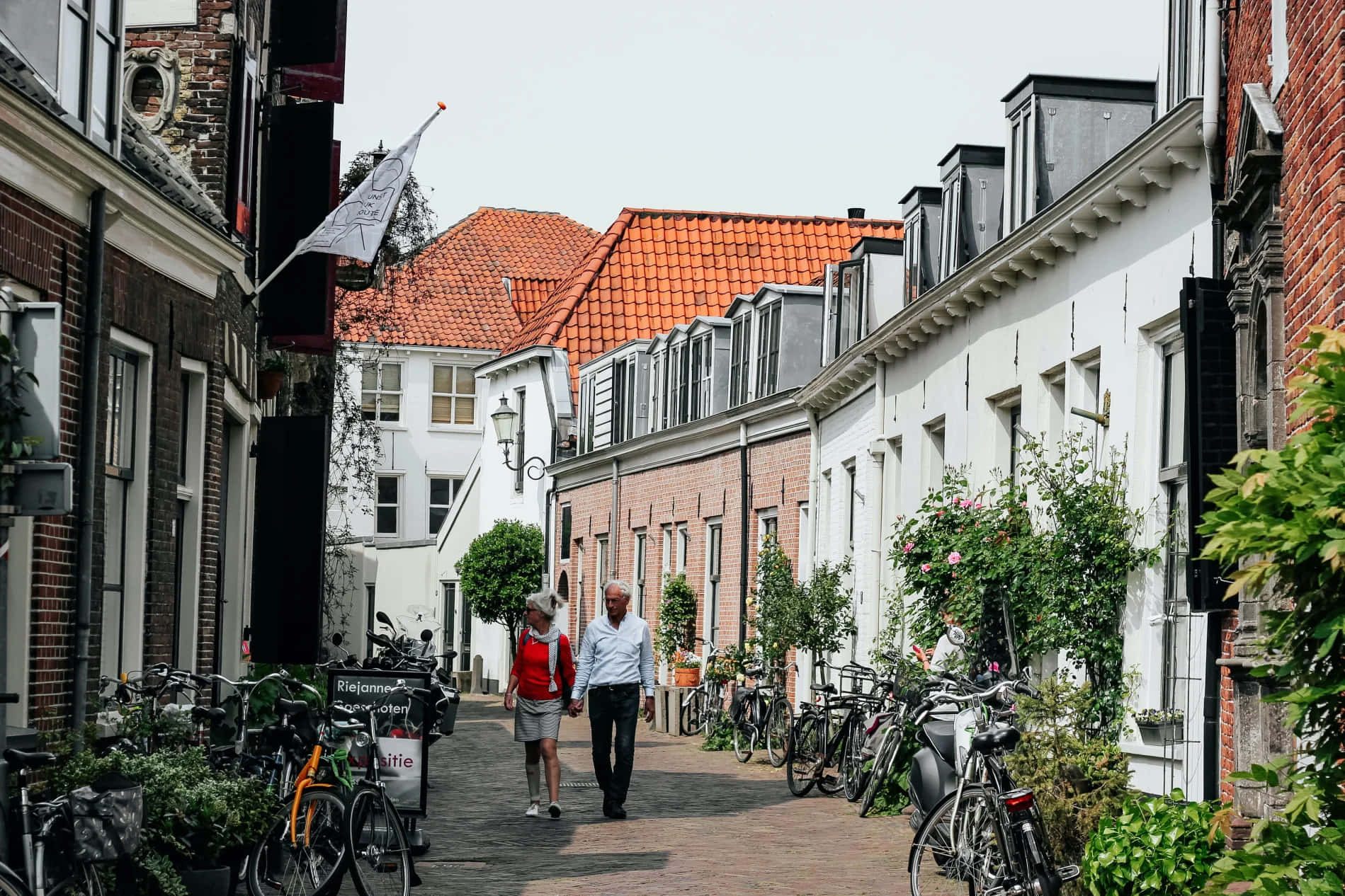 Amersfoort Historic Cityscape With Couple Walking Wallpaper