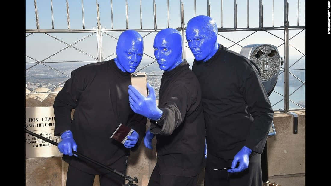 An Amazing Performance Of Blue Man Group Wallpaper