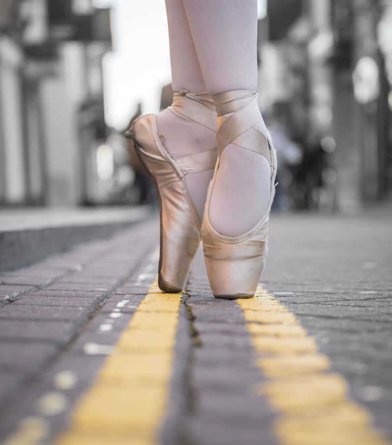 An Artist To Her Craft: The Delicate Beauty Of A Pair Of Pointe Shoes Wallpaper