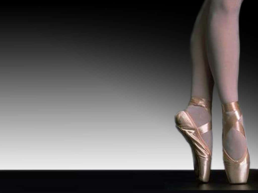 An Artistic Display Of The Beauty Of The Dance Pointe Shoes Wallpaper