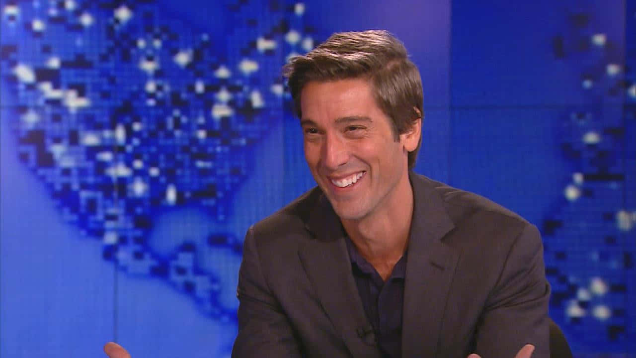 Anchor David Muir With His Captivating Smile Wallpaper