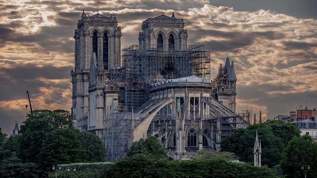 Ancient Gothic Cathedral With Soaring Windows And Gargoyles Wallpaper