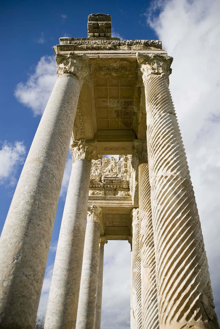 Ancient_ Roman_ Columns_ Skyward_ View.jpg Wallpaper