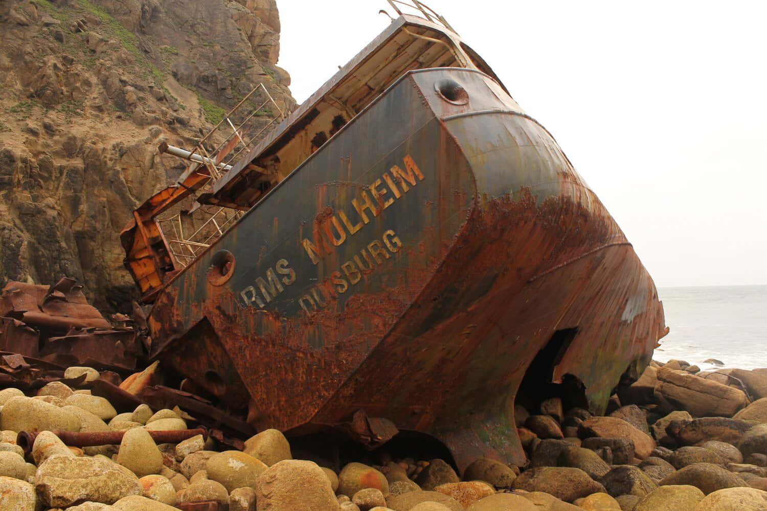 Ancient Shipwreck Embodied In Sunset Wallpaper