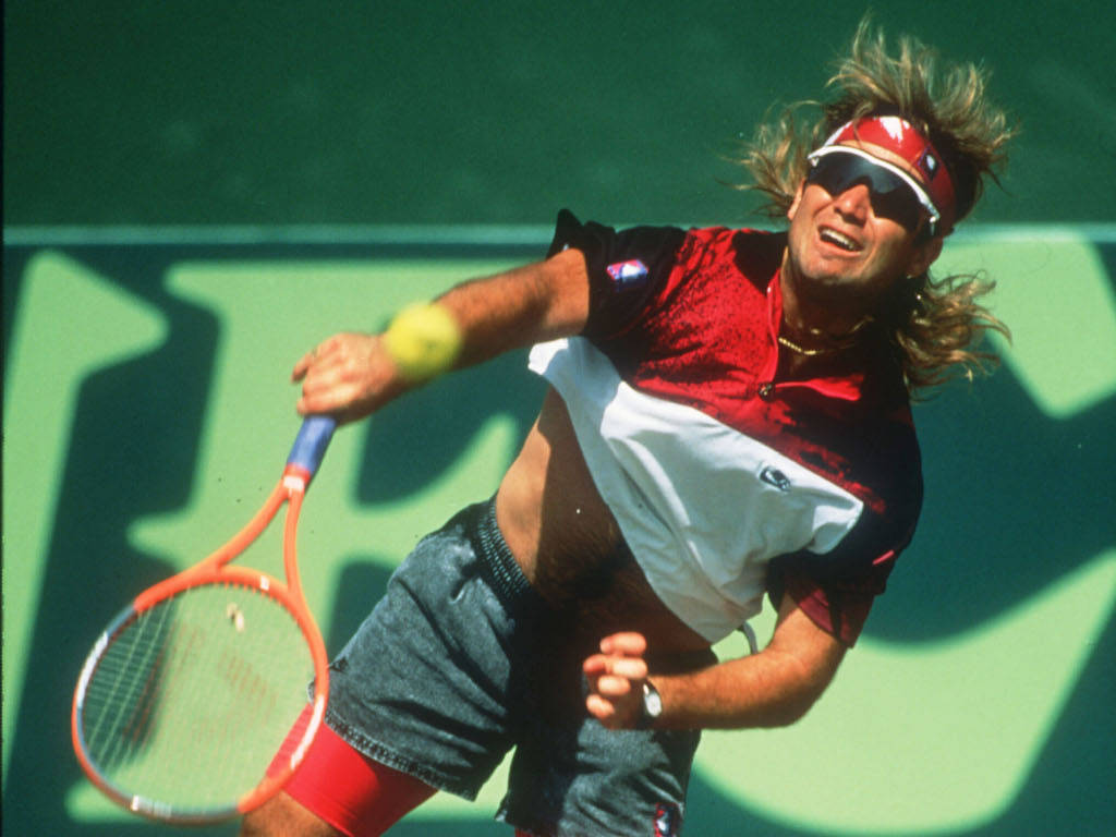 Andre Agassi Flaunting A Pair Of Black Sunglasses Wallpaper