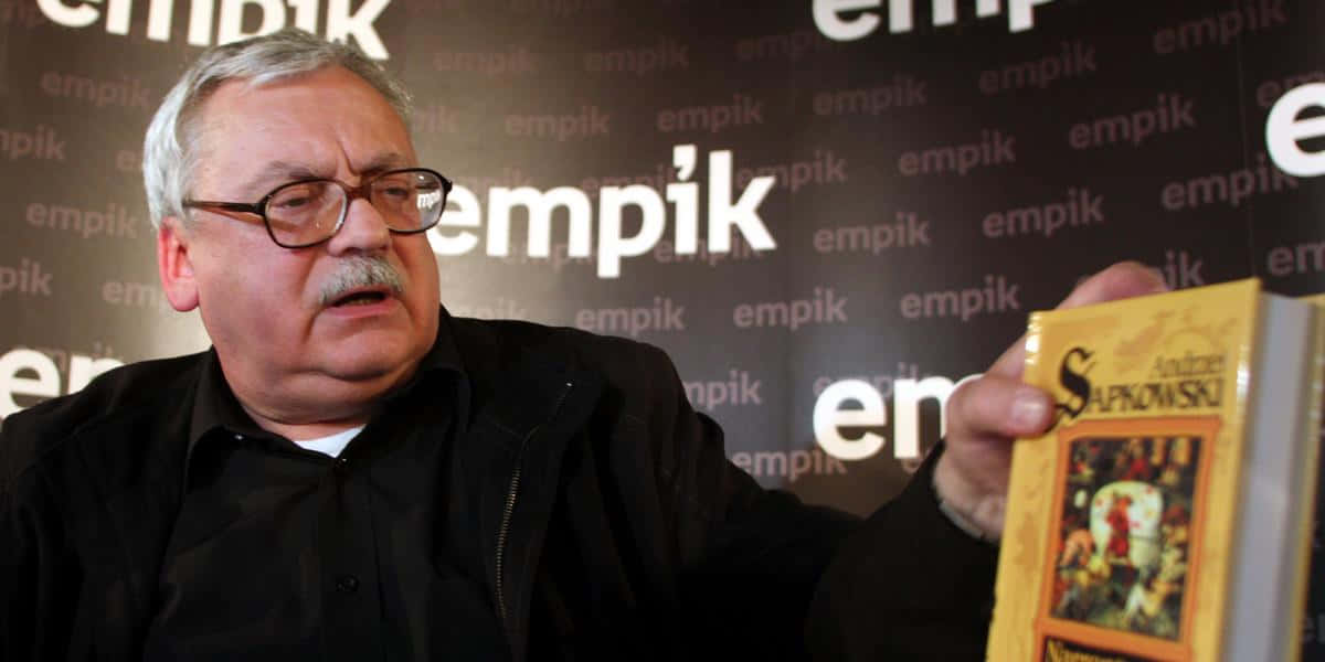 Andrzej Sapkowski Holding Book Wallpaper